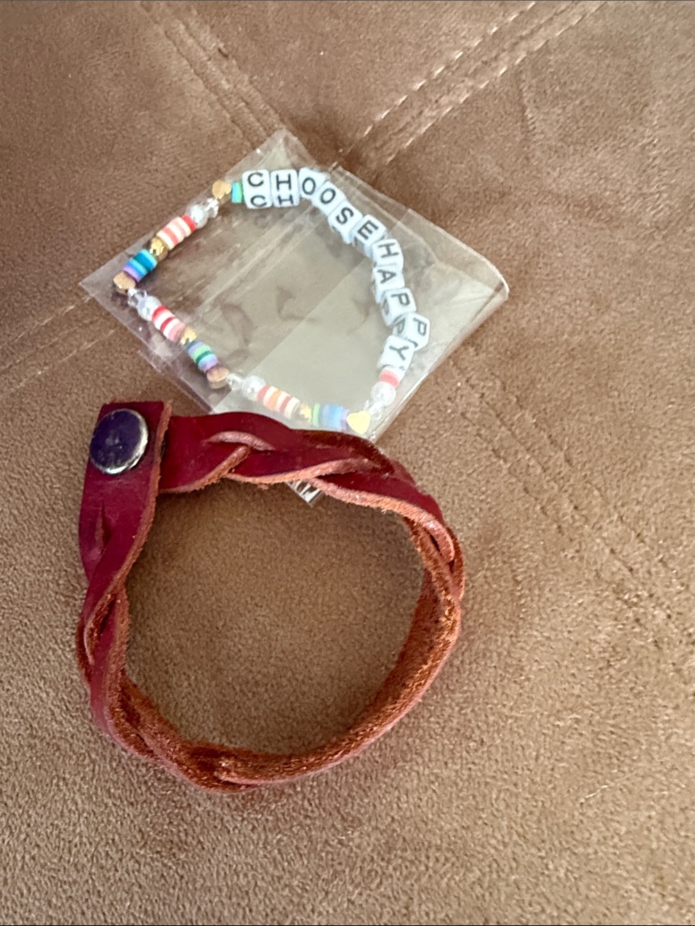 Leather bracelet and “Choose Happy” bracelet
